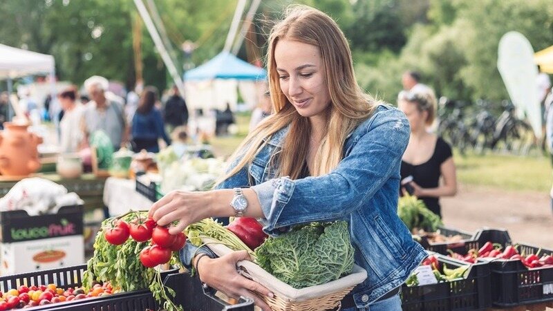 Woman buying vegetables